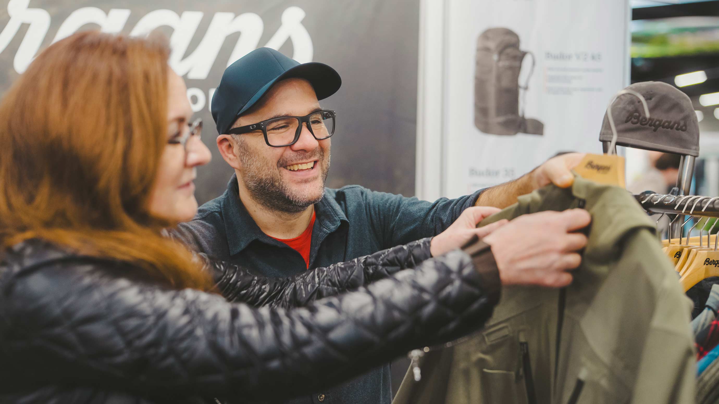 Two people talking about a jacket