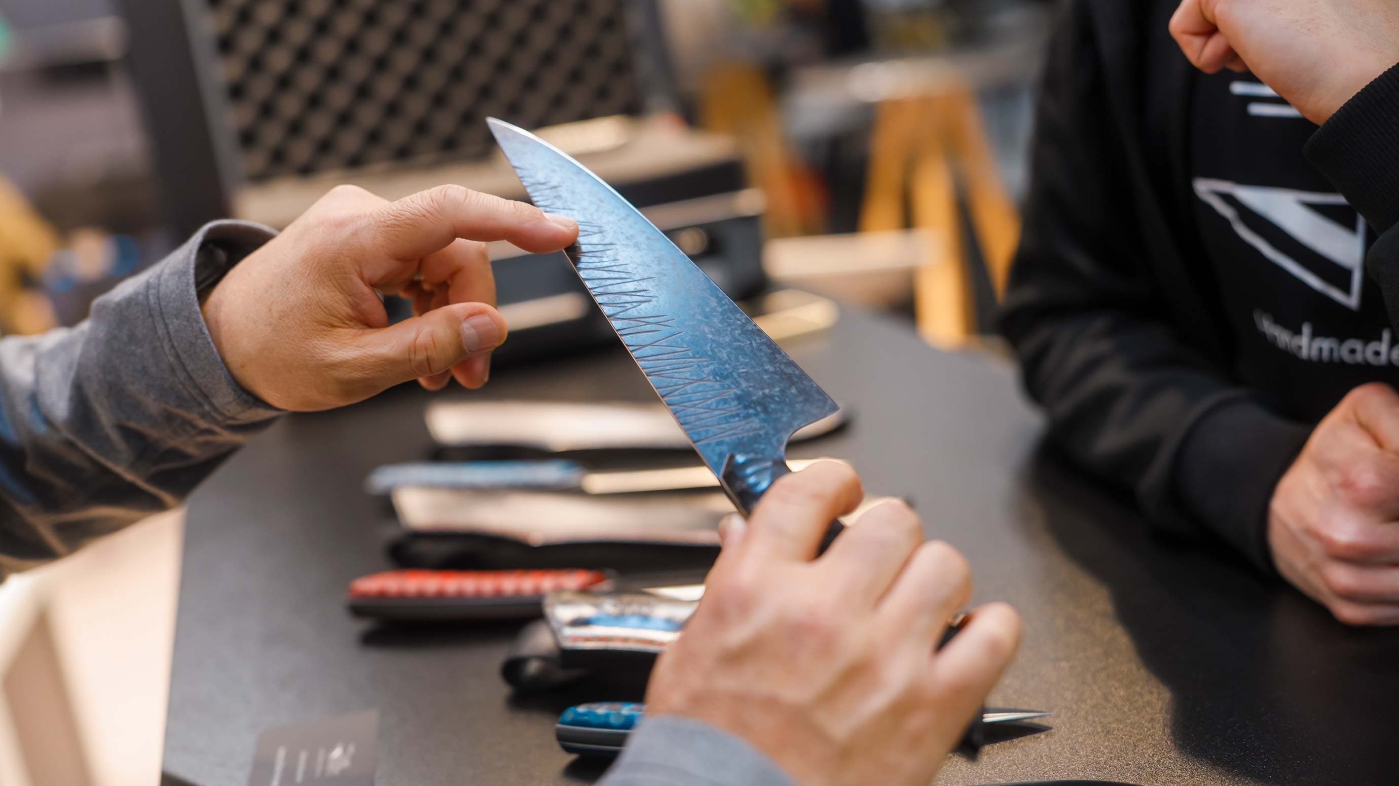 Two people are talking about a knife